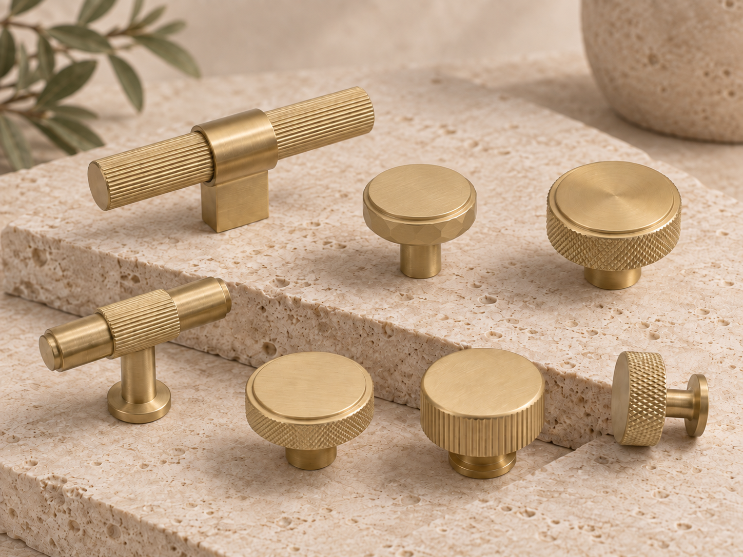 Solid brass cabinet knobs on travertine